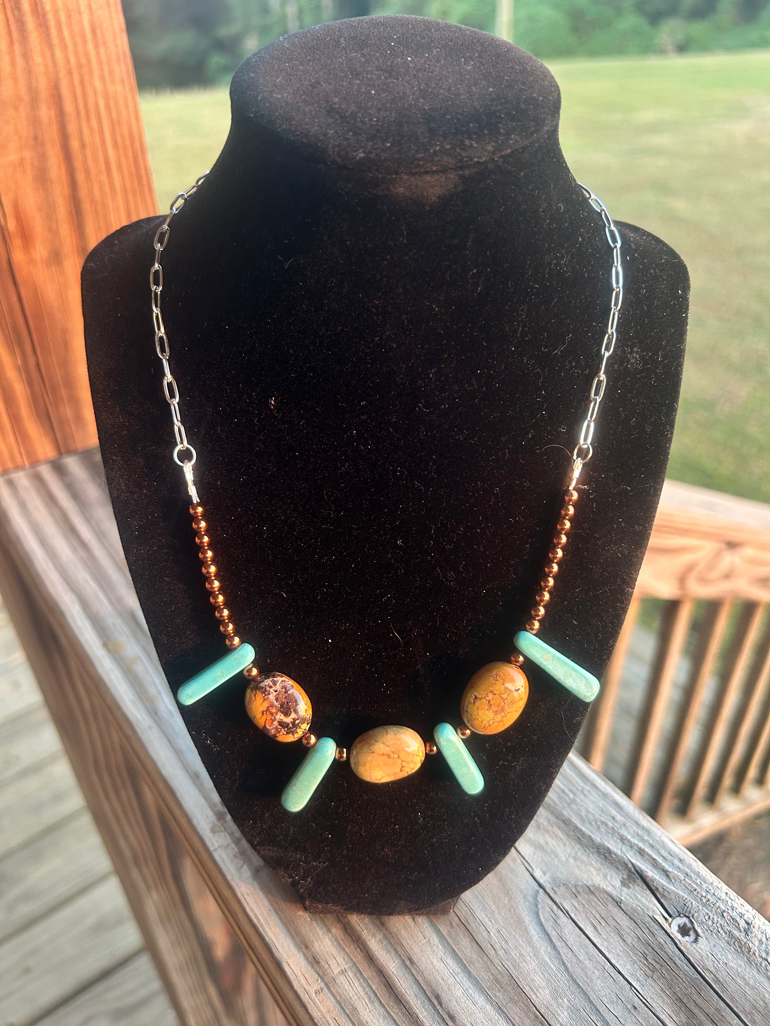 Turquoise-color and bronze-tone handmade western chain necklace with mixed accents.