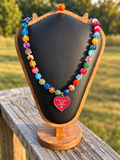 Colorful faceted bead necklace with pink heart charm