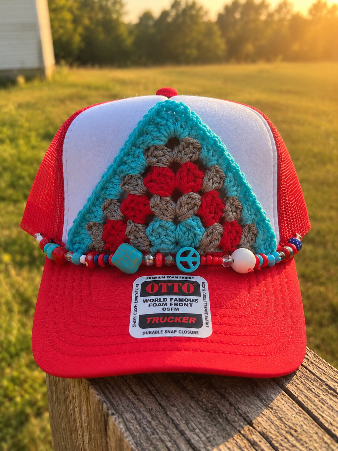 Red and white handmade crochet granny square trucker hat with turquoise and red beaded hat chain